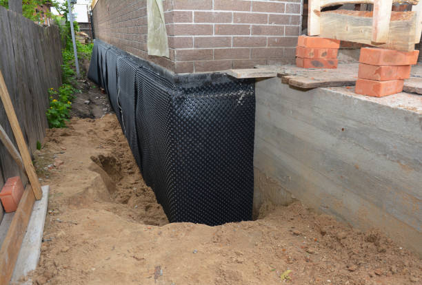 Happy homeowners after waterproofing job in Fort Atkinson